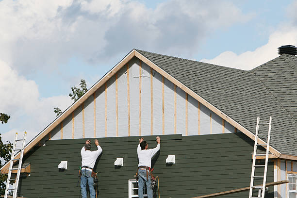 Professional Siding technician working in Manns Choice, PA